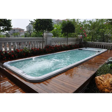 PassionSpa Aquatic 6 Swim Spa med turkost vatten på trädäck