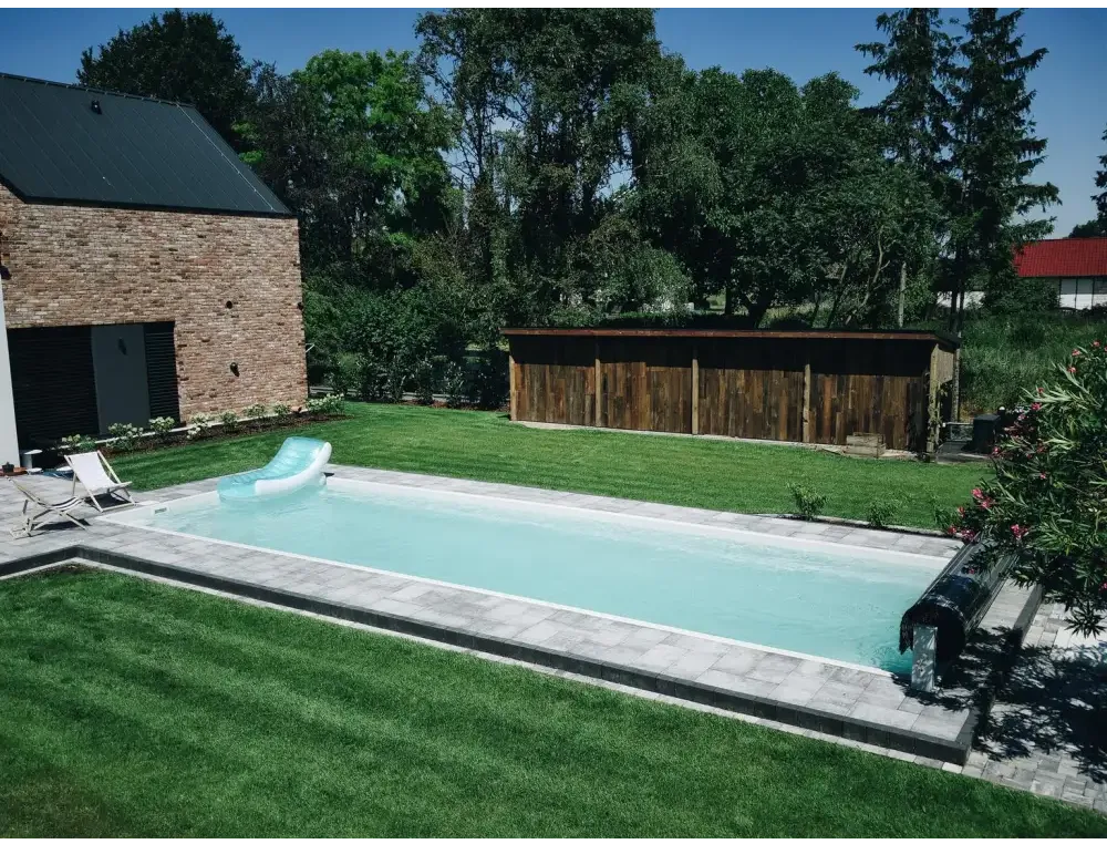 Rektangulär uppblåsbar svanflotte för glasfiberpool Jamaika 25x3 75x1 50m med turkost vatten