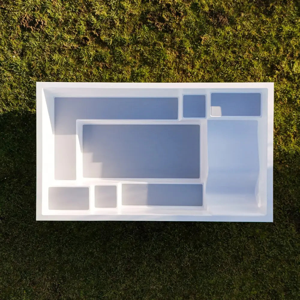 Vit plastorganisator med fack för Minipool Wellness Pool MIRA390 ovanmark